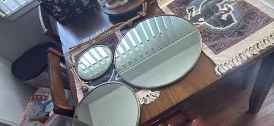 Three wall mirrors