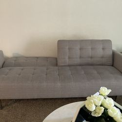 Modern futon couch 80Wx32Dx32H. It’s a 3 seater.