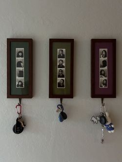 Custom-made wood frame for vintage photo booth film strips
