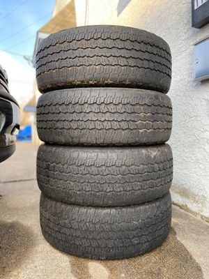 Photo 4) 275/55/20 Goodyear Wrangler Kevlar Tires. Came off a Ford F-150, also common for Expedition, Tahoe, Silverado, Sierra, Ram. About 6/32 $250 for