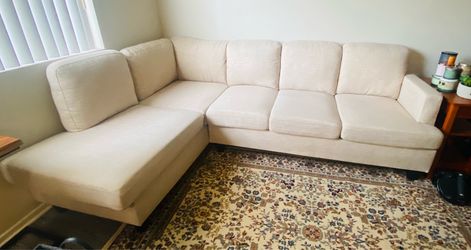 Cream L shaped sofa