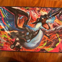 Mega Charizard x premium stitched edged play mats from the mega Charizard x upc