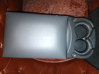 Arm rest center console with cup holders