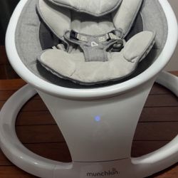 Munchkin Electric Baby Swing/Columpio eléctrico para bebés Munchkin