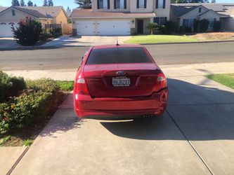 Ford Fusion SE Sedan – Red
