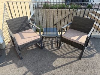 2 chairs with small glass table