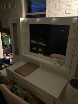Vanity desk with mirror and lights