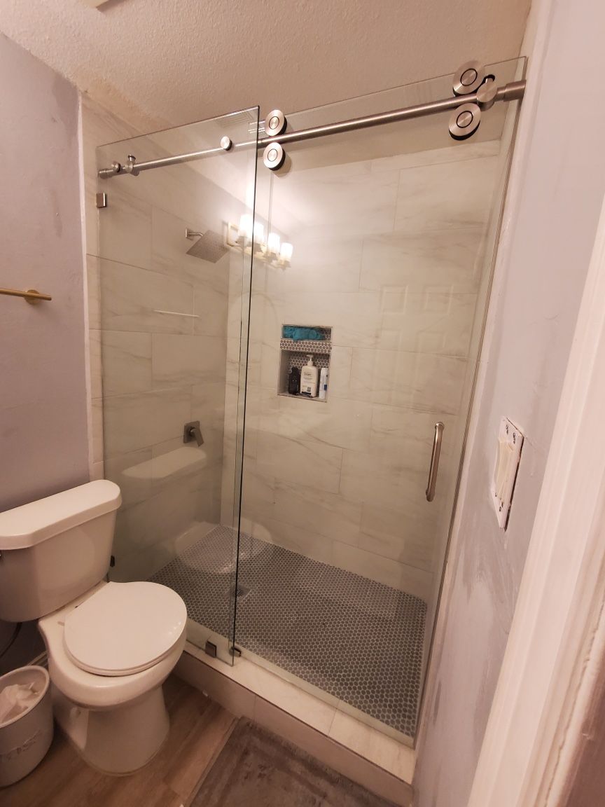 SHOWER DOORS AND GLASS