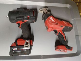 Milwaukee 1/2in drive impact and Milwaukee Hackzall with xc5.0 battery