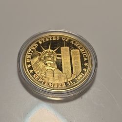 Gold Toned 911 Commerative Coin Encapsulated. Asking $20