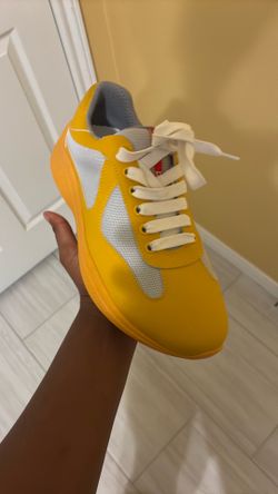 Prada cuffs yellow