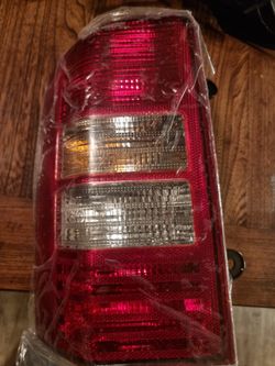 Brand New Jeep Patriot Tail Light Assembly Driver Side
