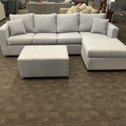 Grey Sectional And Ottoman