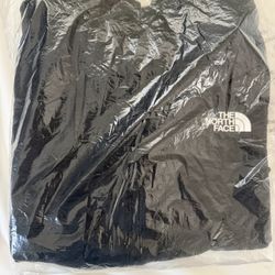 The North Face black windbreaker jacket