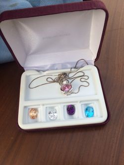 Sterling silver necklace.926 changeable charms $50