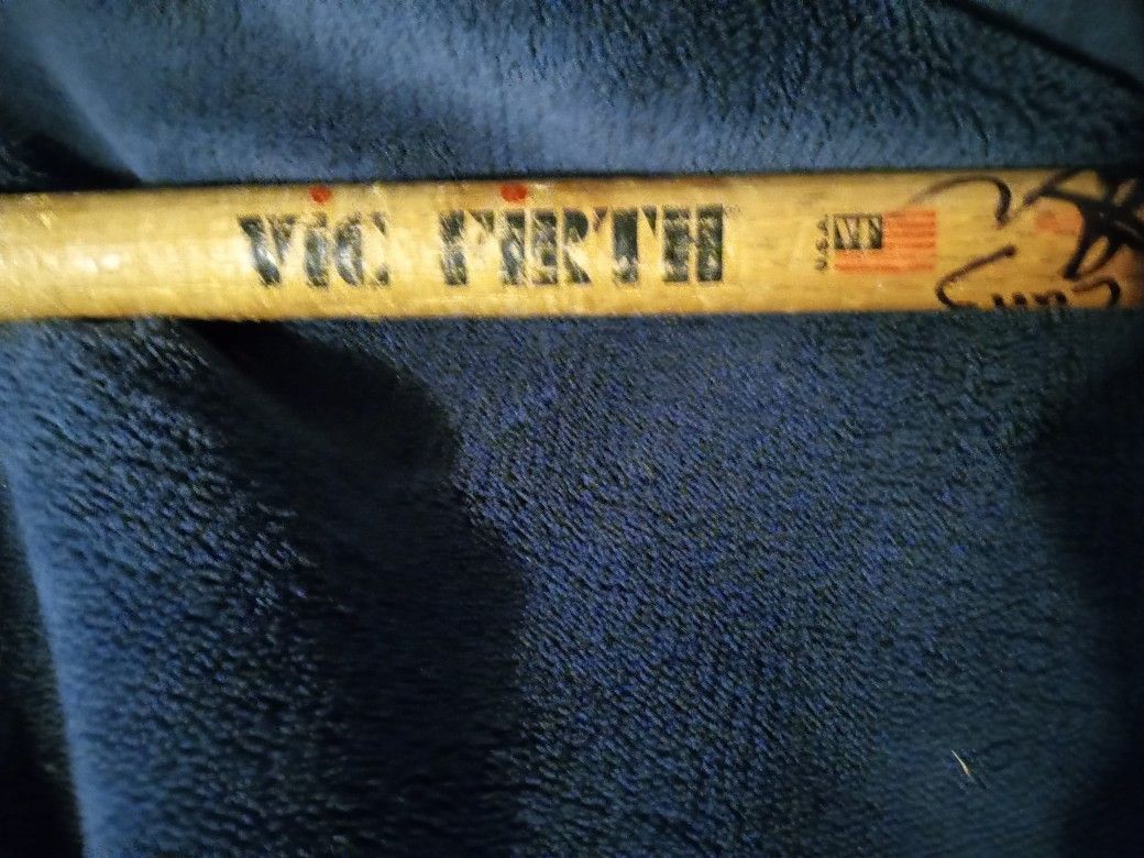 Autographed rock band Korn drumstick
