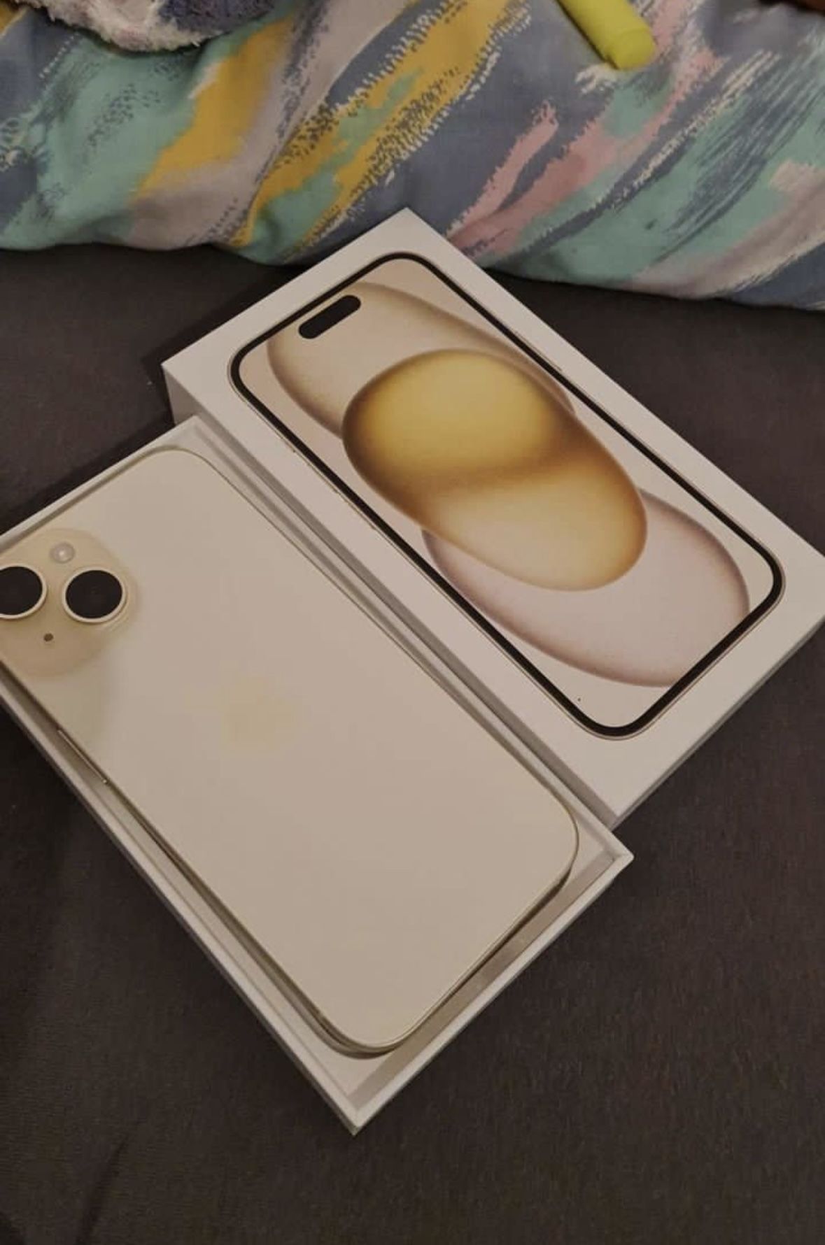 Open Box Yellow iPhone 15