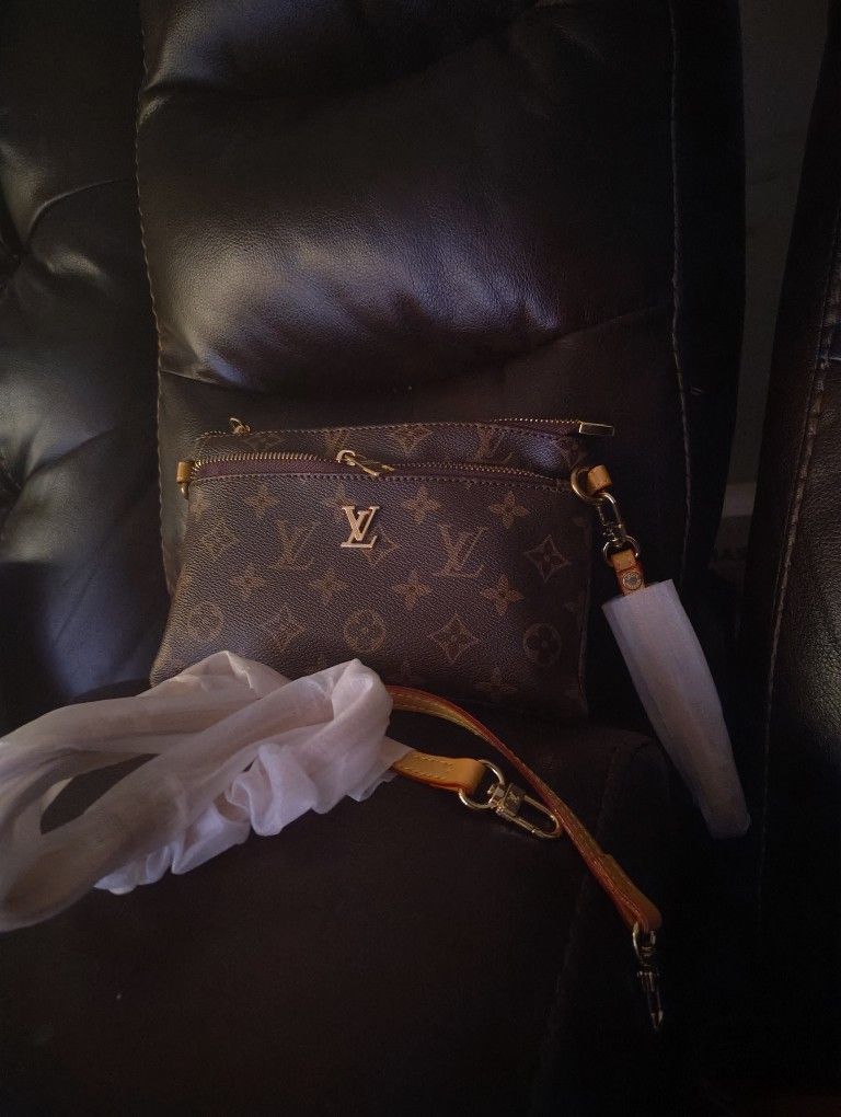 Authentic Like New Wristlet Or Crossbody