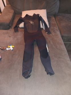 Kids size 8 full suit made by rip curl wetsuit