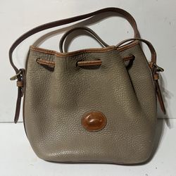 Dooney & Bourke Beige Small Drawstring Bag  Approx 10.5 x 9 x 5”