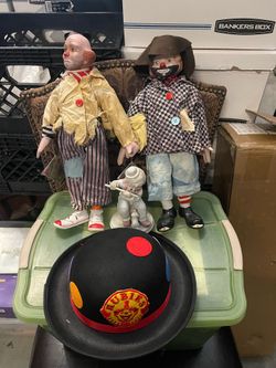 Vintage clown lot . two 16” Porcelain Clowns dolls. One clown hat with clown patch and vintage porcelain clown figurine