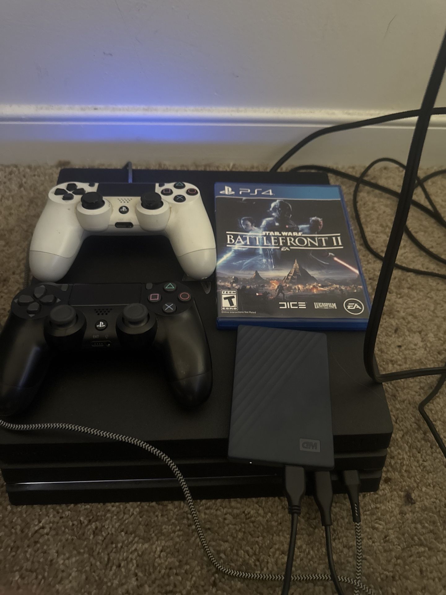 PS4 Pro Bundle (2TB Storage + 2 Controllers + Game) – $240 OBO