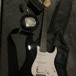 Electric guitar (Donner DST-100 (black))