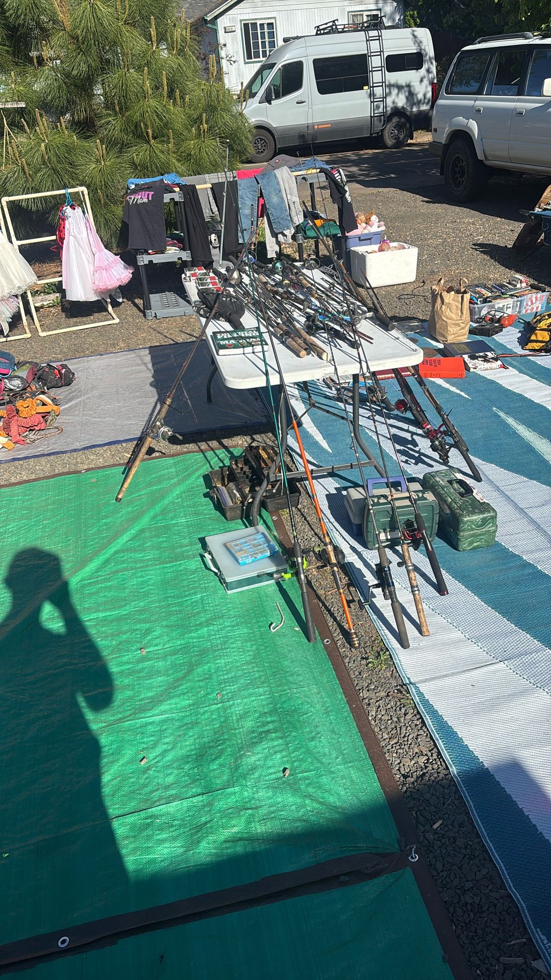 30 fishing poles six tackle boxes, five packs of fishing line