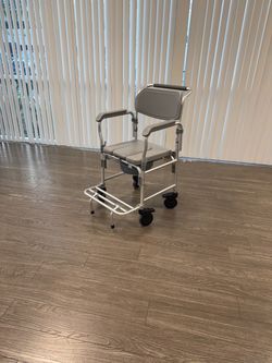 $40 / New/ Commode and shower wheelchair