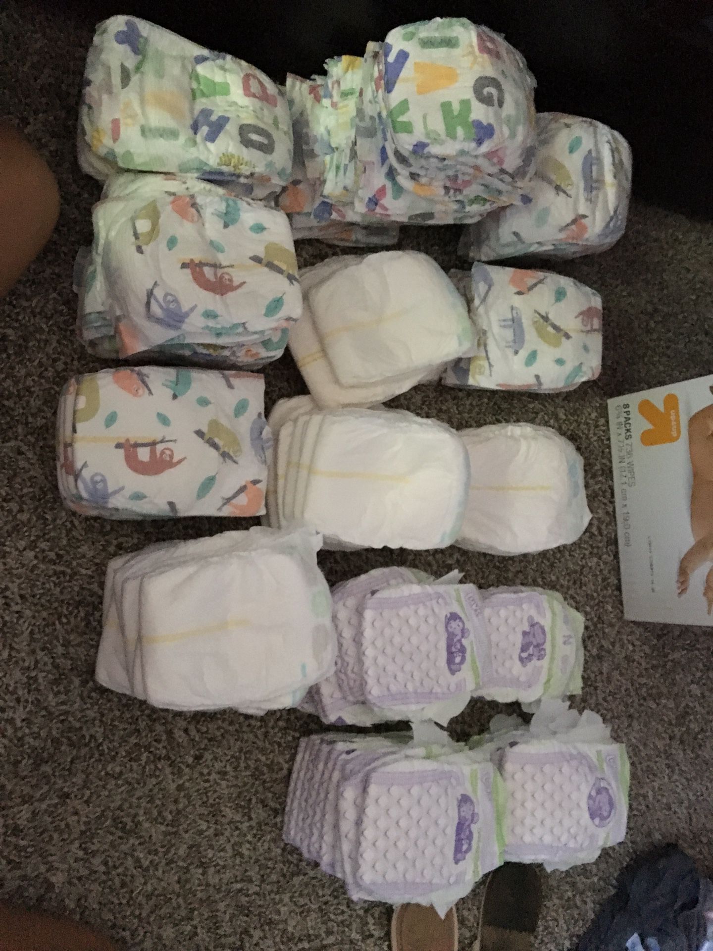 125 diapers size newborn & size 1