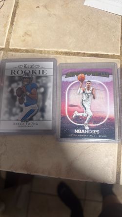 Two cards one football and the other basketball.
