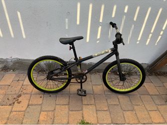Green and black BMX bike