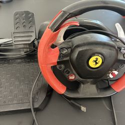 PlayStation Thrustmaster Ferrari Racing Wheel w/pedals. 