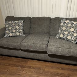 Blue Couch With Pillows 