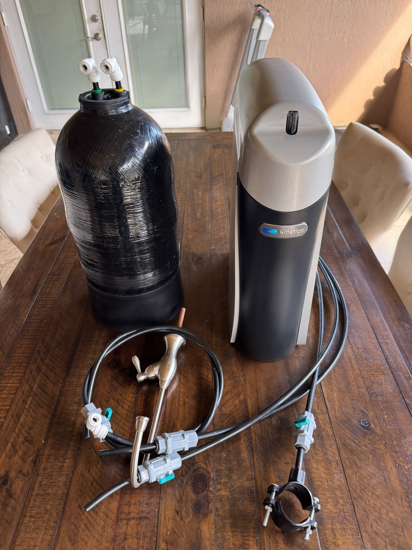 Kinetico K5 Drinking Water Filter System with holding tank, faucet, and hoses. ➡️ This system was left by the previous homeown