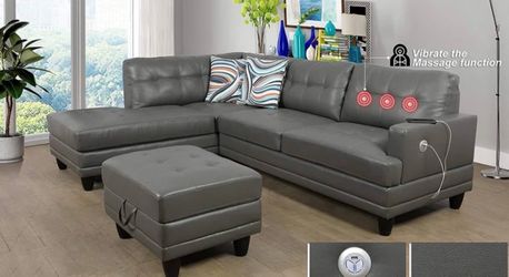 Gray leather sectional couch and ottoman
