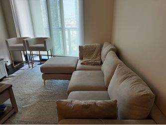 Off white couch with leg rest