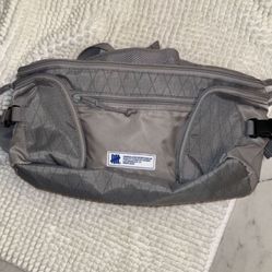 Undefeated Waist and Body Bag