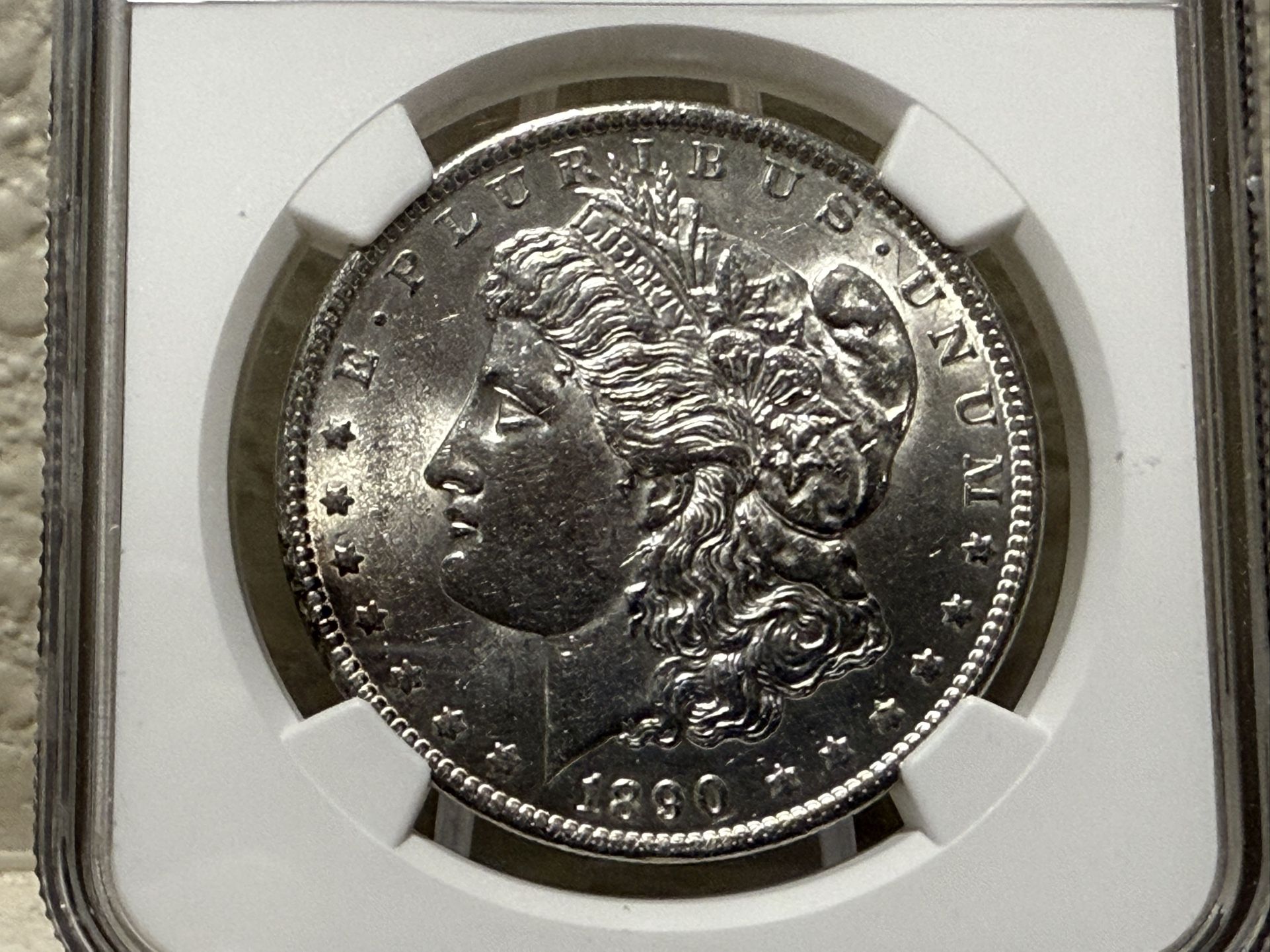 1890 NGC AU58 Morgan Silver Dollar