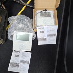 New in boxes Lennox thermostats