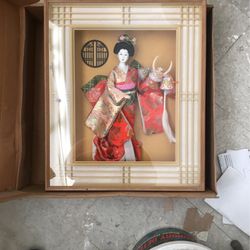 Kokomo Doll Encased In Taditonal Oriental Wood Framing