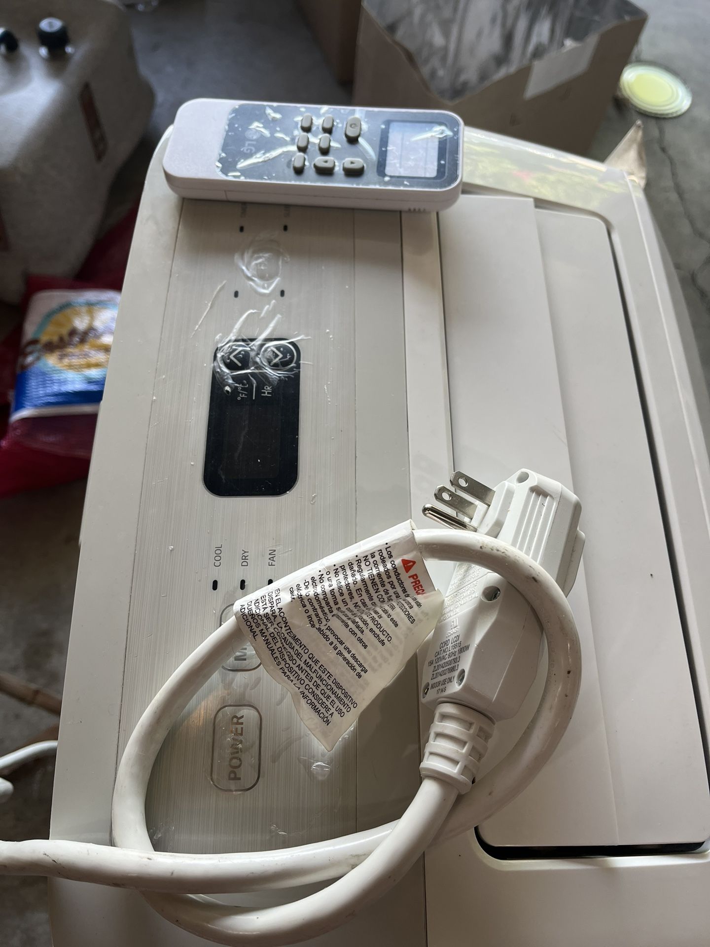 LG portable air conditioner with window accessories