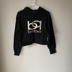 Brand new woman’s Bebe brand black hoodie up for sale 