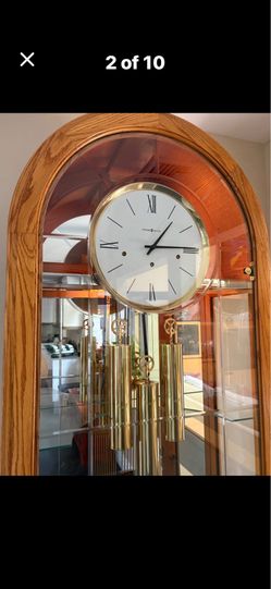 Howard Miller grandfather clock works great moving