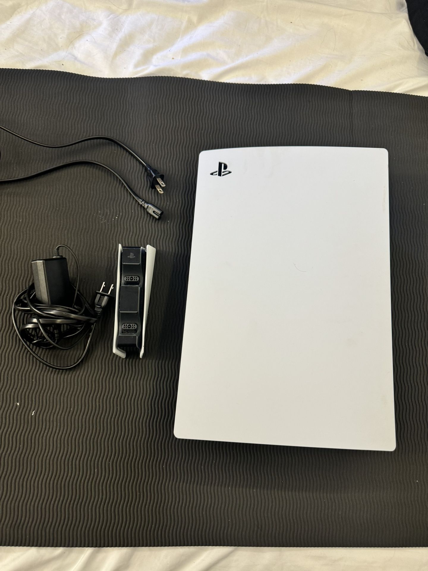 PS5 (Disc) + Charging station.