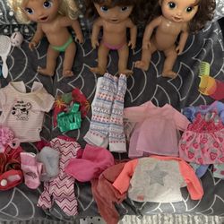 Baby Alive Dolls And Clothing And Combs And Shoes And Other Items