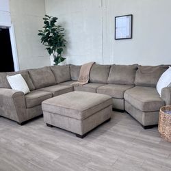 Fast Delivery Available — Bernie & Phyl's Taupe Modern U Sectional Couch w/ Cuddle Corner & Storage Ottoman Set