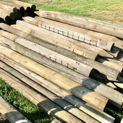 (40+) 5” Used Round Pressure Treated Wood Posts