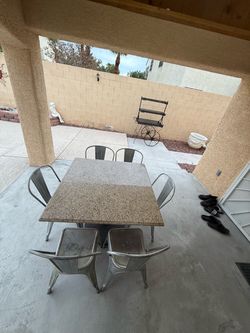 Used real granite Dinner table set with 6 chairs  super heavy  High : 30”  The top is  38” x 38” The chair is seat to floor:17”