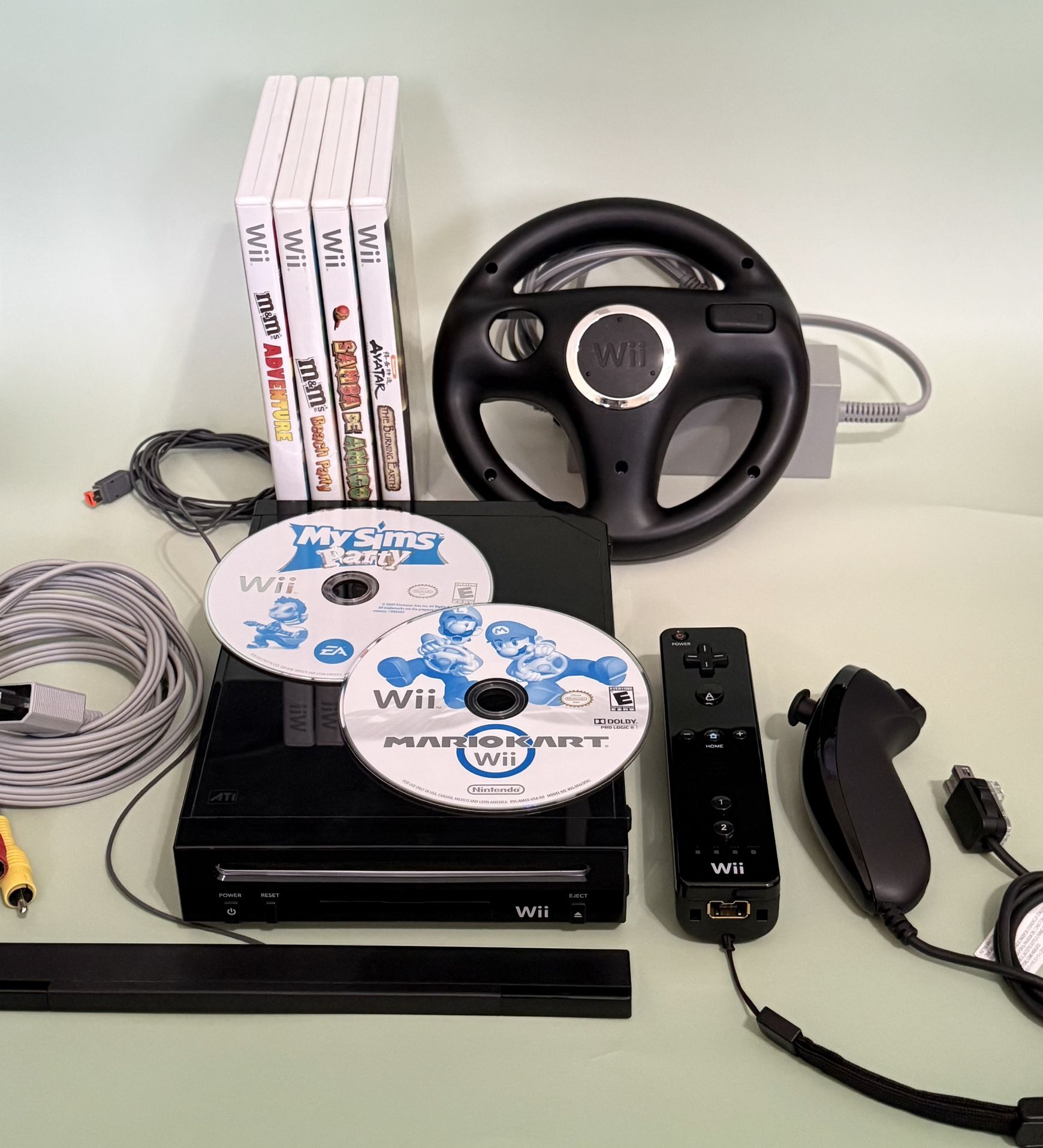 Black Nintendo Wii With Mario Kart , Racing Wheel And More!